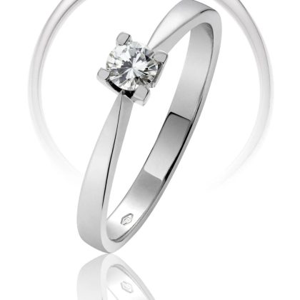 Anillo solitario en oro blanco 18k y diamante modelo monaco